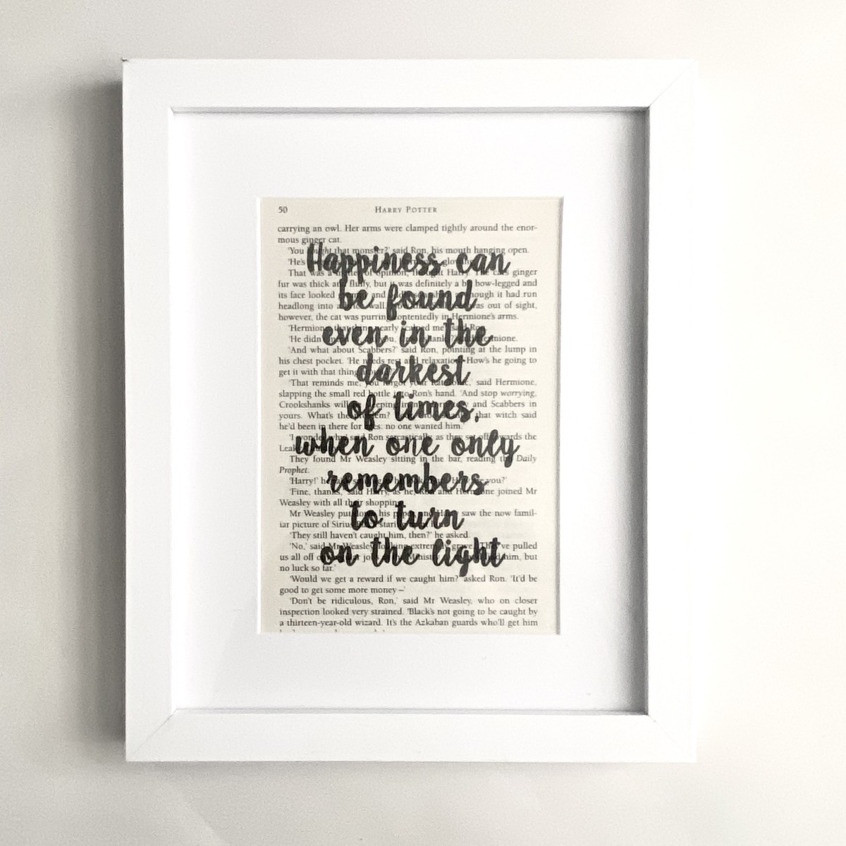Framed book page book quote print - Happiness can be found even in the darkest of times when one only remembers to turn on the light